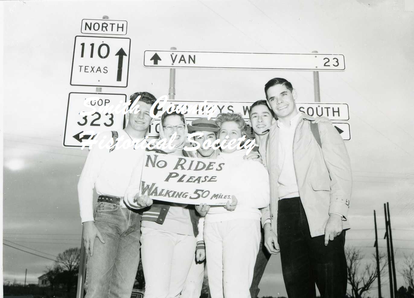 Teenagers on walking challenge (print)